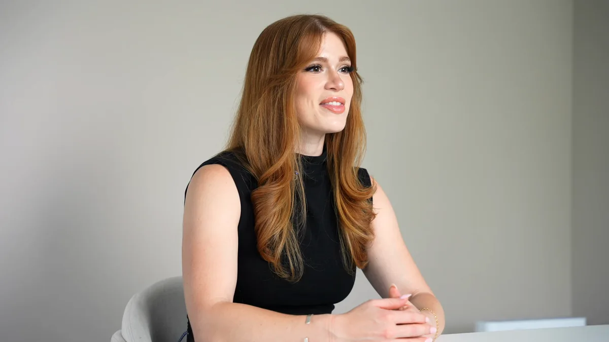 A presenter in the RIMAN Company Training film