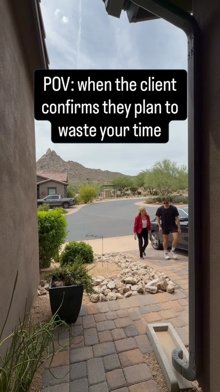 Two people approaching a desert home beneath a humorous caption about a client wasting your time